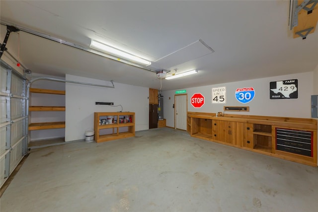 6506 Bunker Hill Ct, Rowlett, TX 75089 - garage with a workshop area, a garage door opener, and water heater