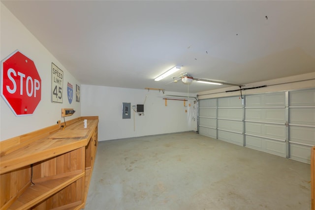 6506 Bunker Hill Ct, Rowlett, TX 75089 - garage featuring electric panel and a garage door opener
