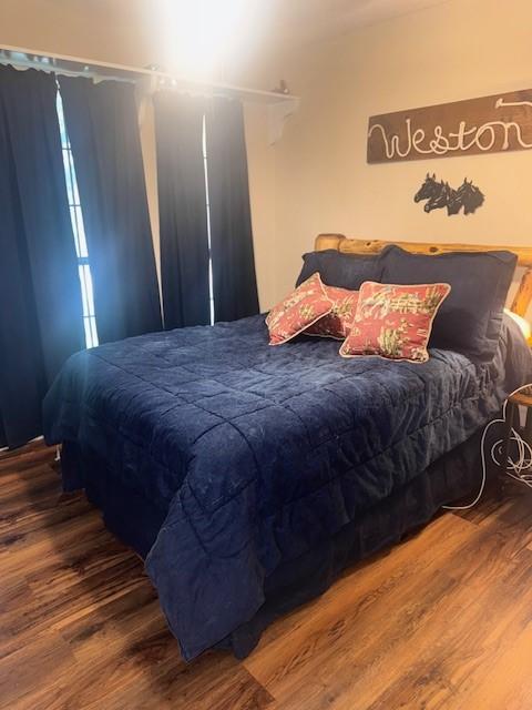 226 Colonial Cir, Athens, TX 75751 - bedroom with wood finished floors