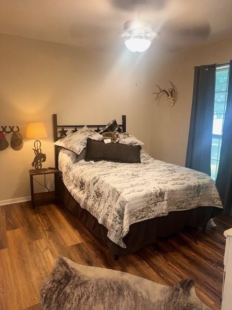 226 Colonial Cir, Athens, TX 75751 - bedroom featuring wood finished floors, baseboards, and ceiling fan