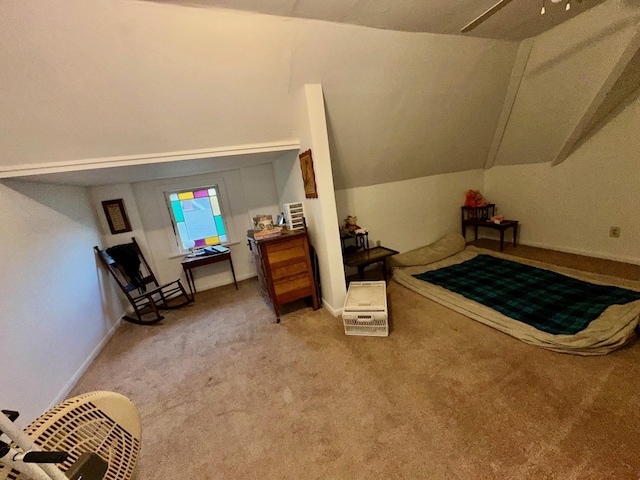 618 W Chestnut St, Denison, TX 75020 - bedroom featuring light carpet and vaulted ceiling
