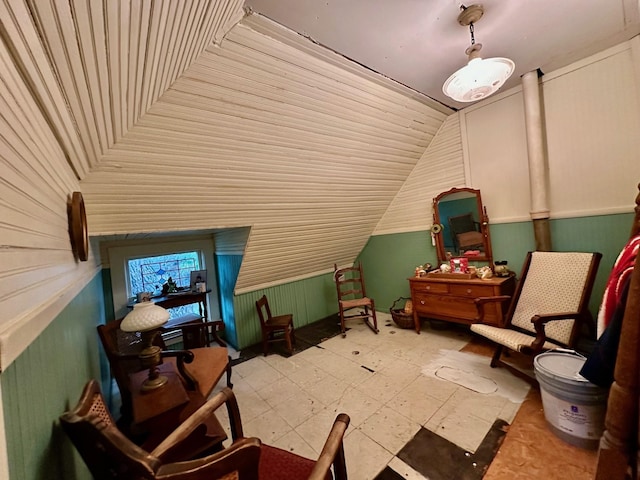 618 W Chestnut St, Denison, TX 75020 - additional living space with vaulted ceiling and wooden walls