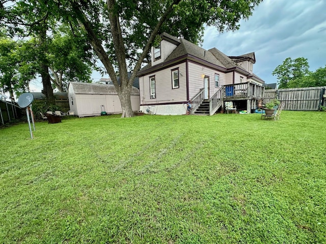 618 W Chestnut St, Denison, TX 75020 - back of property featuring a wooden deck and stairs