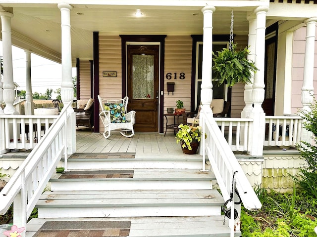 618 W Chestnut St, Denison, TX 75020 - view of exterior entry featuring covered porch