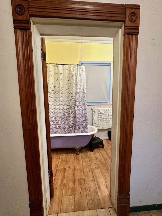 618 W Chestnut St, Denison, TX 75020 - corridor featuring light wood-style flooring
