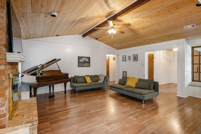 1807 Roosevelt Ct, Pantego, TX 76013 - living room featuring hardwood / wood-style flooring, a ceiling fan, wood ceiling, and a brick fireplace