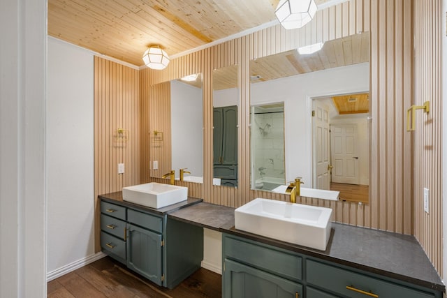 1807 Roosevelt Ct, Pantego, TX 76013 - full bath with double vanity, wood ceiling, wood finished floors, crown molding, and  shower combination