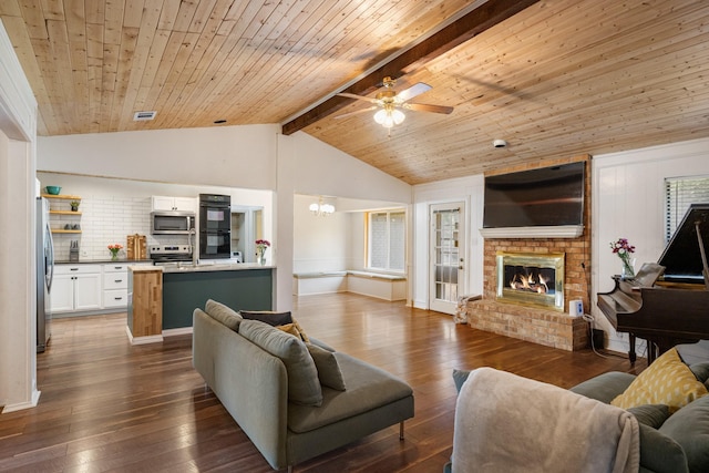 1807 Roosevelt Ct, Pantego, TX 76013 - living room with dark wood-style floors, a fireplace, a ceiling fan, wood ceiling, and baseboards