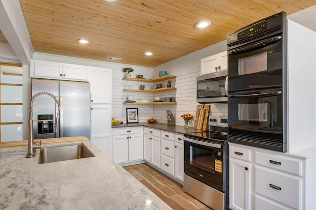 1807 Roosevelt Ct, Pantego, TX 76013 - kitchen with stainless steel appliances, wood ceiling, backsplash, open shelves, and white cabinetry
