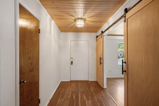 1807 Roosevelt Ct, Pantego, TX 76013 - corridor with a barn door, wood-type flooring, crown molding, wooden ceiling, and baseboards