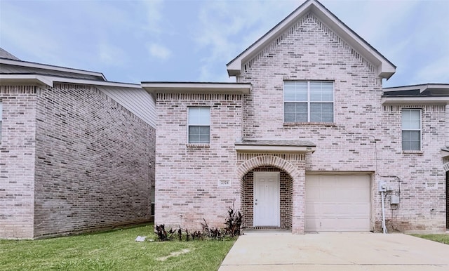 2324 Homewood Ln, Grand Prairie, TX 75050 - view of front facade featuring brick siding, a garage, and driveway