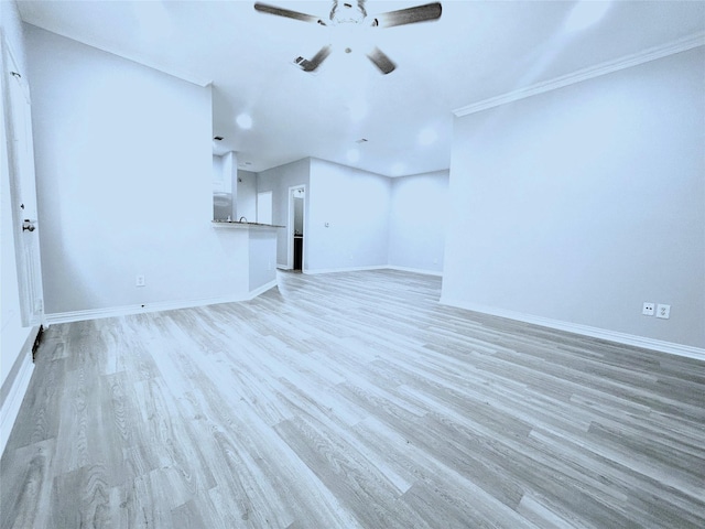2324 Homewood Ln, Grand Prairie, TX 75050 - unfurnished living room with a ceiling fan, light wood finished floors, baseboards, and crown molding