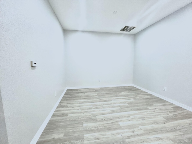 2324 Homewood Ln, Grand Prairie, TX 75050 - spare room with wood finished floors and baseboards