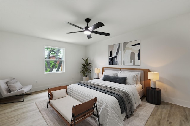 1309 Northpark Dr, Richardson, TX 75081 - bedroom featuring wood finished floors, baseboards, and ceiling fan