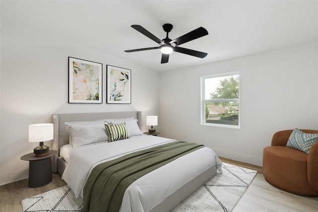1309 Northpark Dr, Richardson, TX 75081 - bedroom featuring wood finished floors, baseboards, and a ceiling fan