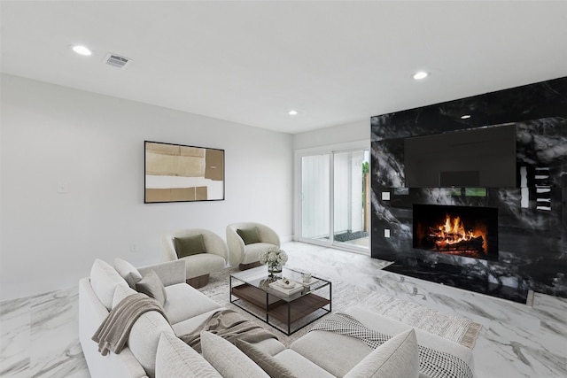 1309 Northpark Dr, Richardson, TX 75081 - living area with marble tiled floors, recessed lighting, and a premium fireplace