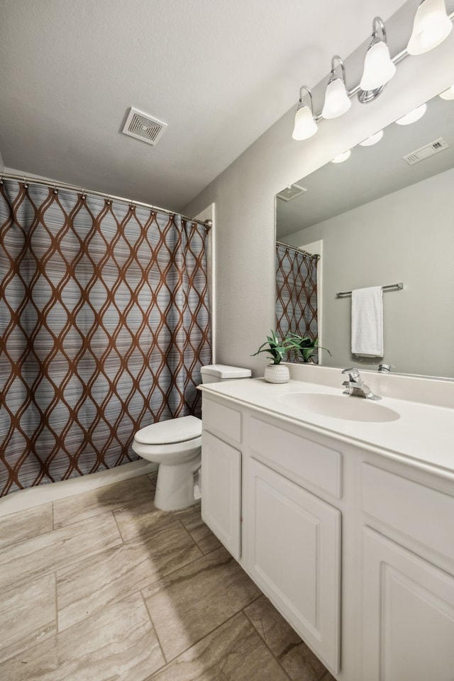 7308 Claridge Ln, Mckinney, TX 75072 - bathroom with vanity and toilet