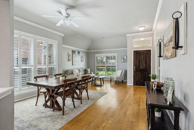 7308 Claridge Ln, Mckinney, TX 75072 - dining area featuring wood finished floors, a ceiling fan, ornamental molding, vaulted ceiling, and baseboards