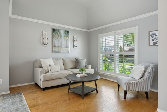 7308 Claridge Ln, Mckinney, TX 75072 - living room featuring plenty of natural light, light wood finished floors, ornamental molding, baseboards, and vaulted ceiling
