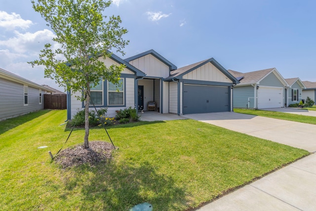 6514 Whitecap Dr, Princeton, TX 75407 - view of front facade featuring board and batten siding, driveway, and a garage