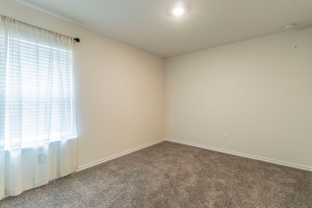 6514 Whitecap Dr, Princeton, TX 75407 - carpeted spare room with a smoke detector and baseboards