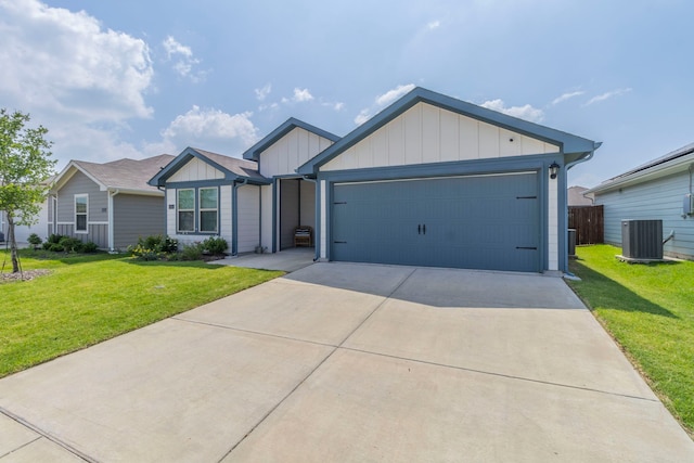 6514 Whitecap Dr, Princeton, TX 75407 - ranch-style house featuring board and batten siding, central air condition unit, driveway, and a garage