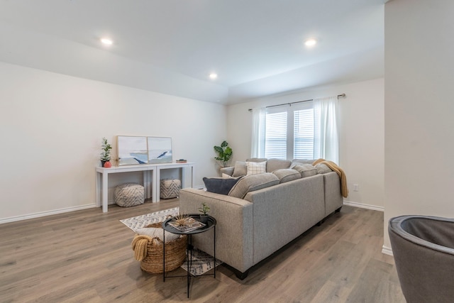 6514 Whitecap Dr, Princeton, TX 75407 - living area with wood finished floors, baseboards, and recessed lighting