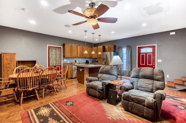 6811 Pecan St, Frisco, TX 75034 - living room with ceiling fan, light wood-style floors, and recessed lighting
