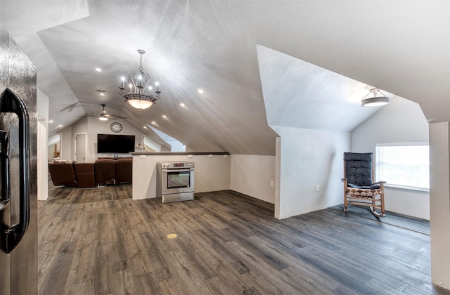 6811 Pecan St, Frisco, TX 75034 - bonus room with lofted ceiling, ceiling fan, dark wood-style floors, and a chandelier