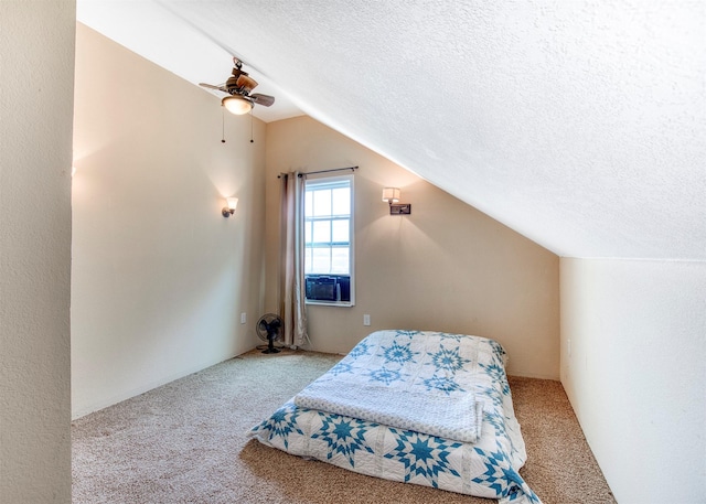 6811 Pecan St, Frisco, TX 75034 - carpeted bedroom with lofted ceiling, a textured ceiling, a ceiling fan, and cooling unit