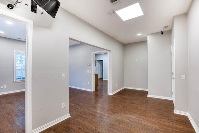 6811 Pecan St, Frisco, TX 75034 - empty room with wood finished floors, baseboards, a smoke detector, and recessed lighting