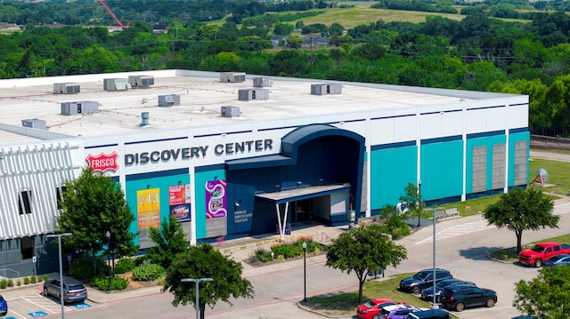 6811 Pecan St, Frisco, TX 75034 - view of building exterior featuring uncovered parking and cooling unit