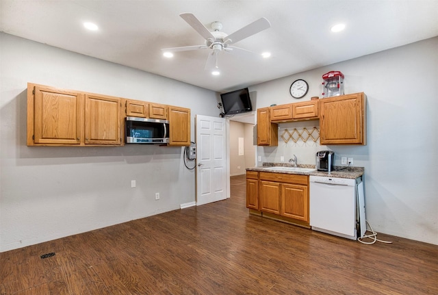 6811 Pecan St, Frisco, TX 75034 - kitchen featuring white dishwasher, stainless steel microwave, dark wood-style flooring, a sink, and ceiling fan