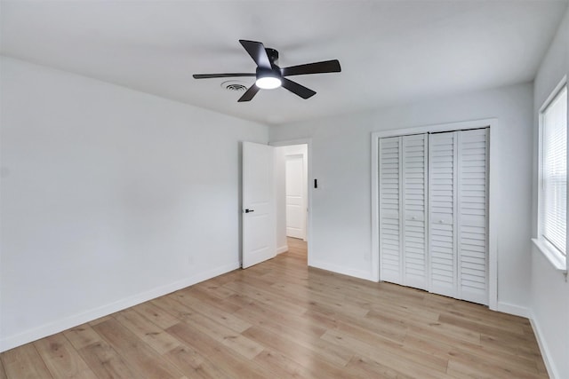3524 Bahamas Dr, Mesquite, TX 75150 - unfurnished bedroom with light wood finished floors, baseboards, and a closet
