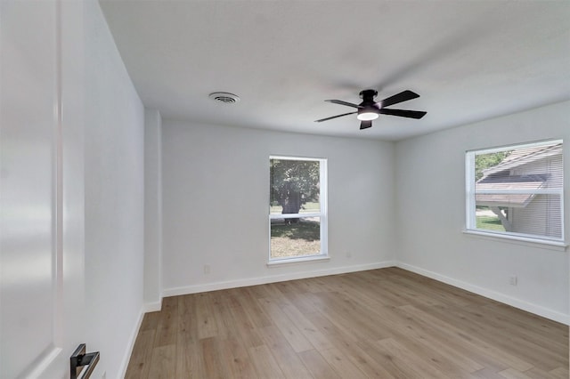 3524 Bahamas Dr, Mesquite, TX 75150 - spare room with light wood finished floors, ceiling fan, and baseboards