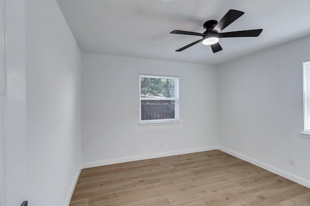3524 Bahamas Dr, Mesquite, TX 75150 - unfurnished room with light wood finished floors, ceiling fan, and baseboards