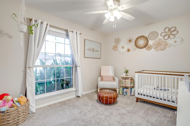 412 Hanover St, Burleson, TX 76028 - carpeted bedroom featuring a crib, ceiling fan, and baseboards