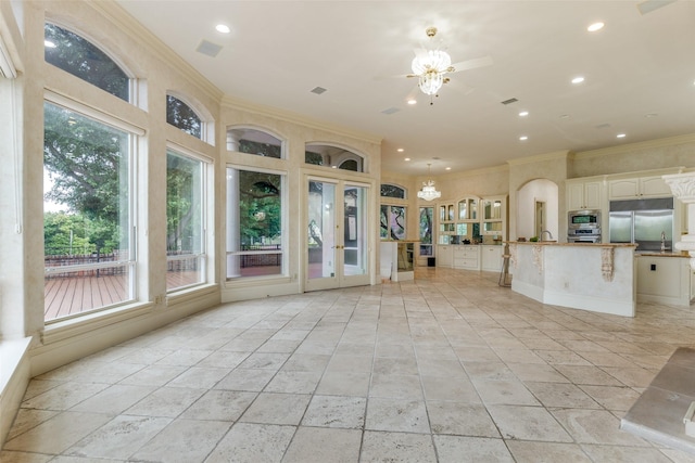 5528 Gleneagles Dr, Plano, TX 75093 - unfurnished sunroom with healthy amount of natural light, french doors, and a chandelier