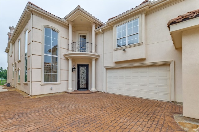 5528 Gleneagles Dr, Plano, TX 75093 - view of front of home featuring a balcony and stucco siding