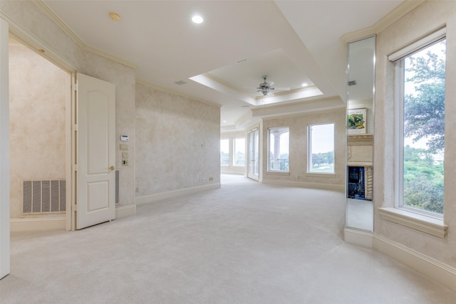 5528 Gleneagles Dr, Plano, TX 75093 - unfurnished living room with ceiling fan, carpet, a tray ceiling, crown molding, and recessed lighting
