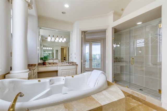 5528 Gleneagles Dr, Plano, TX 75093 - bathroom featuring vanity, a garden tub, a stall shower, ornate columns, and ornamental molding