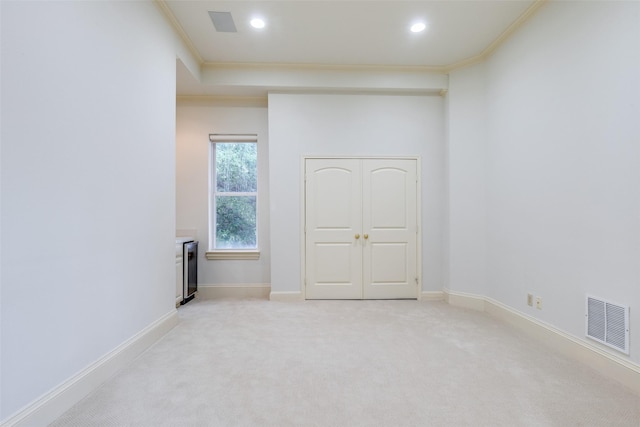 5528 Gleneagles Dr, Plano, TX 75093 - unfurnished room featuring crown molding, light carpet, baseboards, and recessed lighting