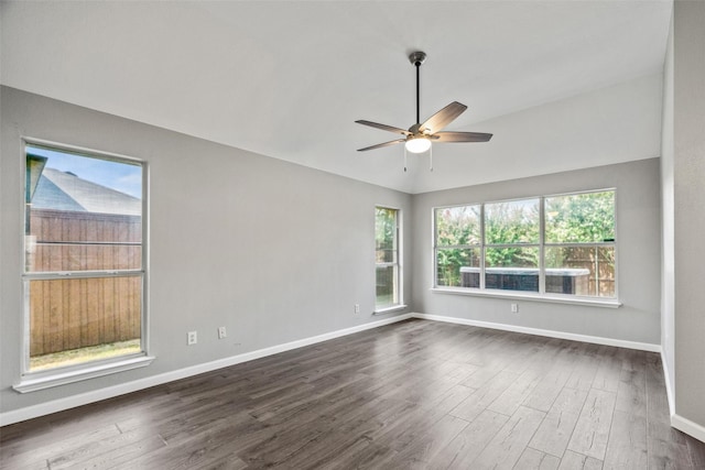 5409 Highlands Dr, Mckinney, TX 75070 - unfurnished room featuring ceiling fan, dark wood-style flooring, baseboards, and vaulted ceiling
