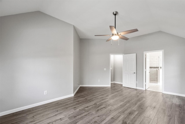 5409 Highlands Dr, Mckinney, TX 75070 - unfurnished bedroom featuring lofted ceiling, wood finished floors, baseboards, a ceiling fan, and connected bathroom