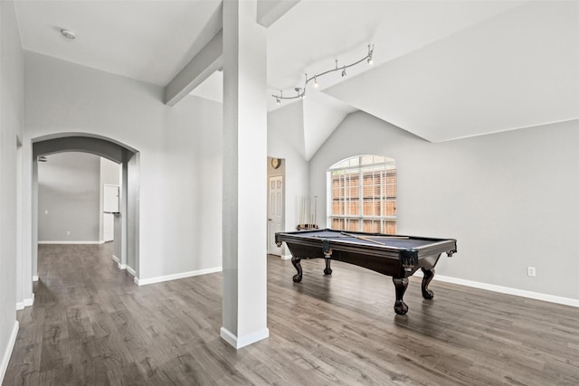 5409 Highlands Dr, Mckinney, TX 75070 - playroom with arched walkways, vaulted ceiling, pool table, baseboards, and wood finished floors