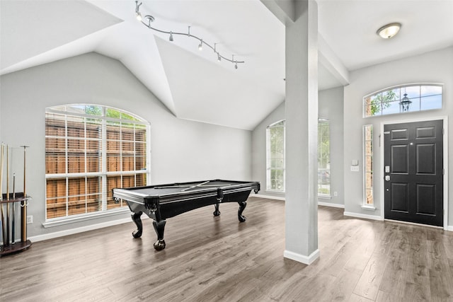 5409 Highlands Dr, Mckinney, TX 75070 - entryway with billiards table, vaulted ceiling, wood finished floors, plenty of natural light, and baseboards