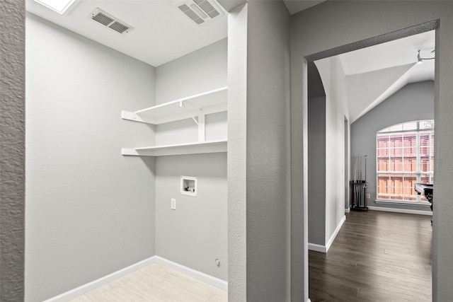 5409 Highlands Dr, Mckinney, TX 75070 - washroom featuring washer hookup, wood finished floors, and baseboards