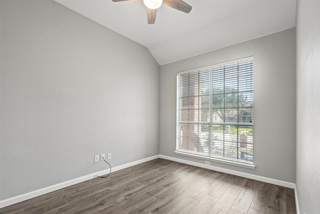 5409 Highlands Dr, Mckinney, TX 75070 - spare room with healthy amount of natural light, ceiling fan, dark wood-type flooring, baseboards, and lofted ceiling