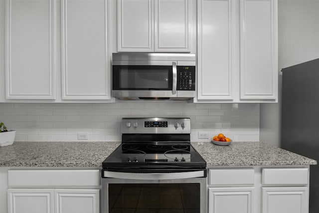 60 Misty Mesa Trl, Mansfield, TX 76063 - kitchen with appliances with stainless steel finishes and white cabinets