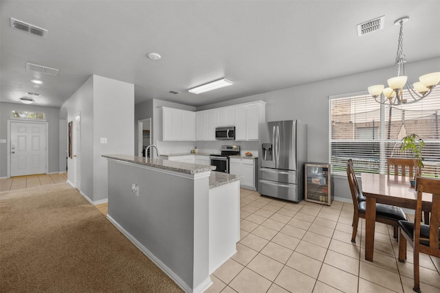 60 Misty Mesa Trl, Mansfield, TX 76063 - kitchen featuring appliances with stainless steel finishes, plenty of natural light, and baseboards